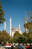a large white building with two towers on top of it