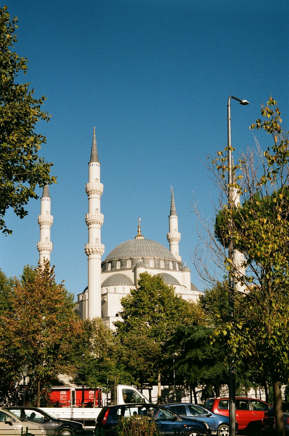 a large white building with two towers on top of it