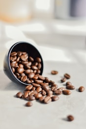 a close up of a cup of coffee beans