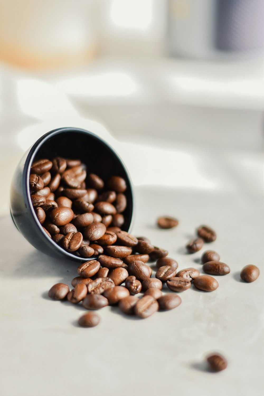 a close up of a cup of coffee beans