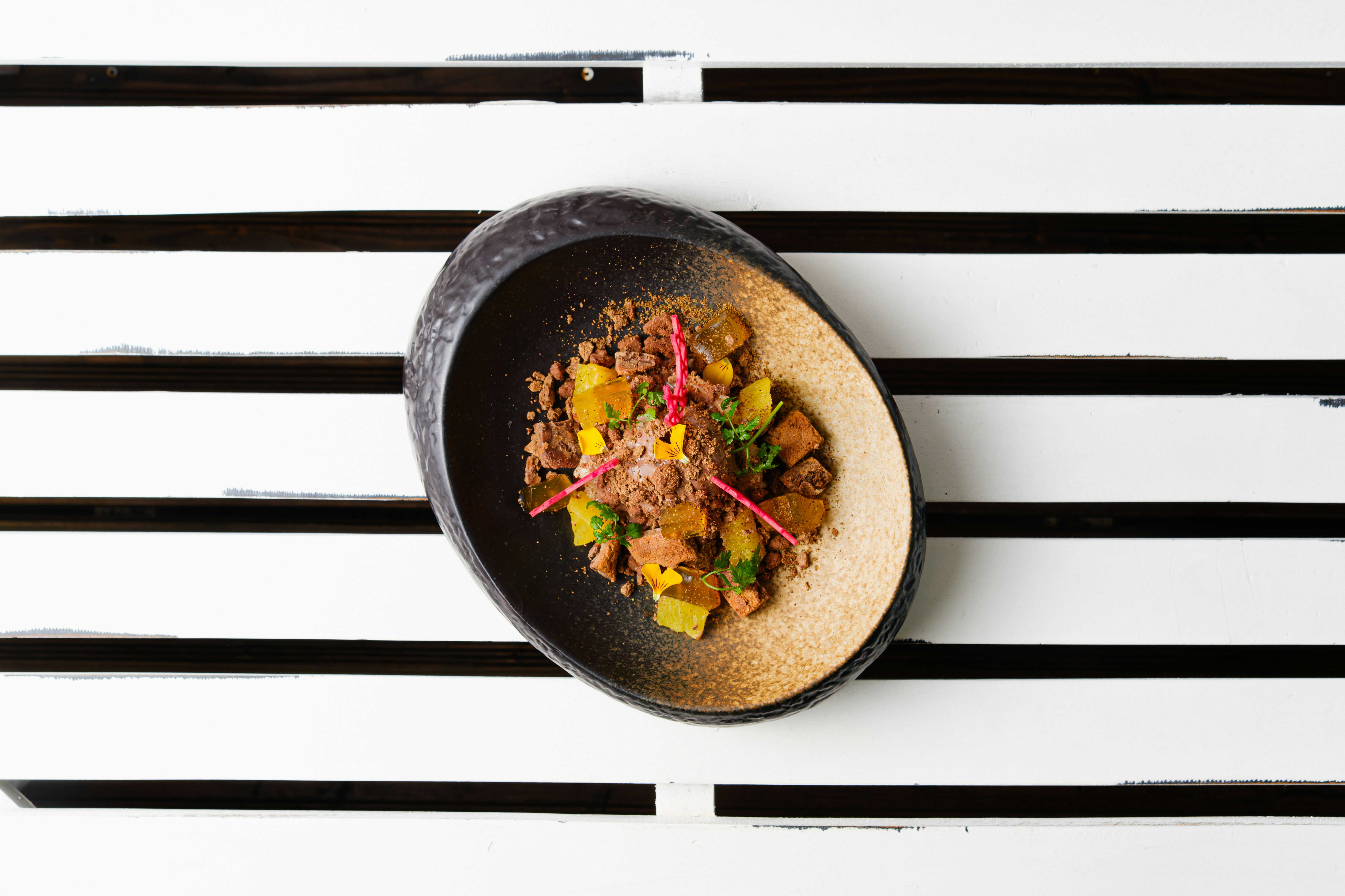 a plate of food sitting on top of a table
