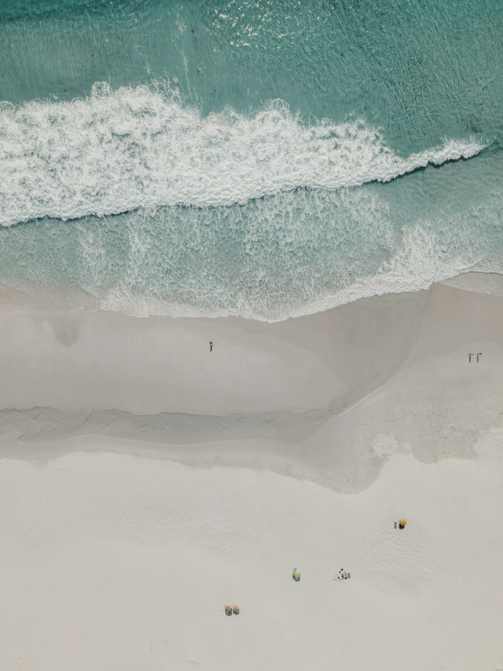 an aerial view of a beach and ocean