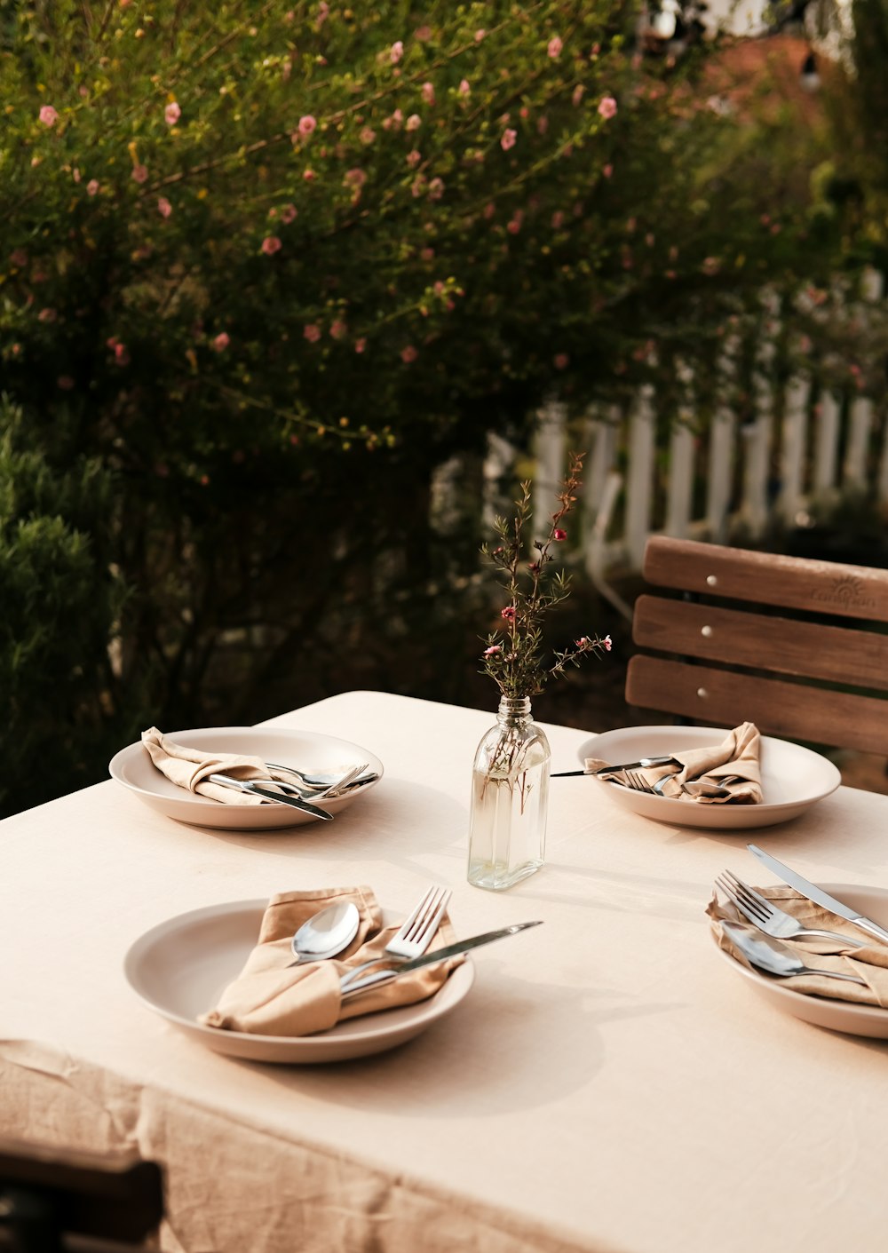 a table with plates and silverware on it