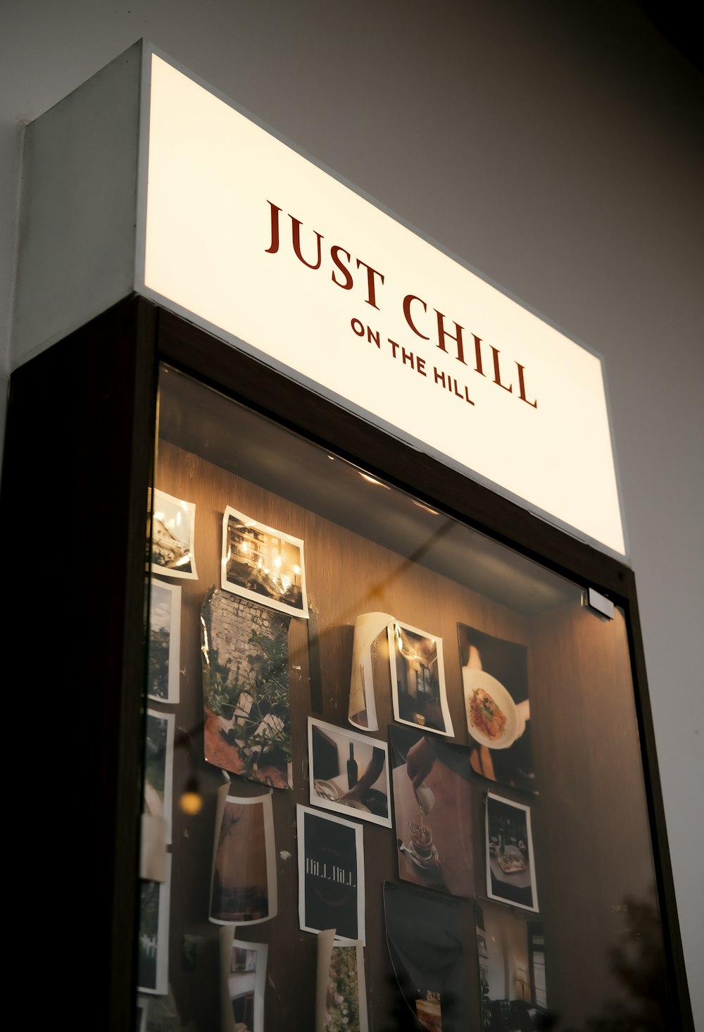 a display case with pictures of people on it