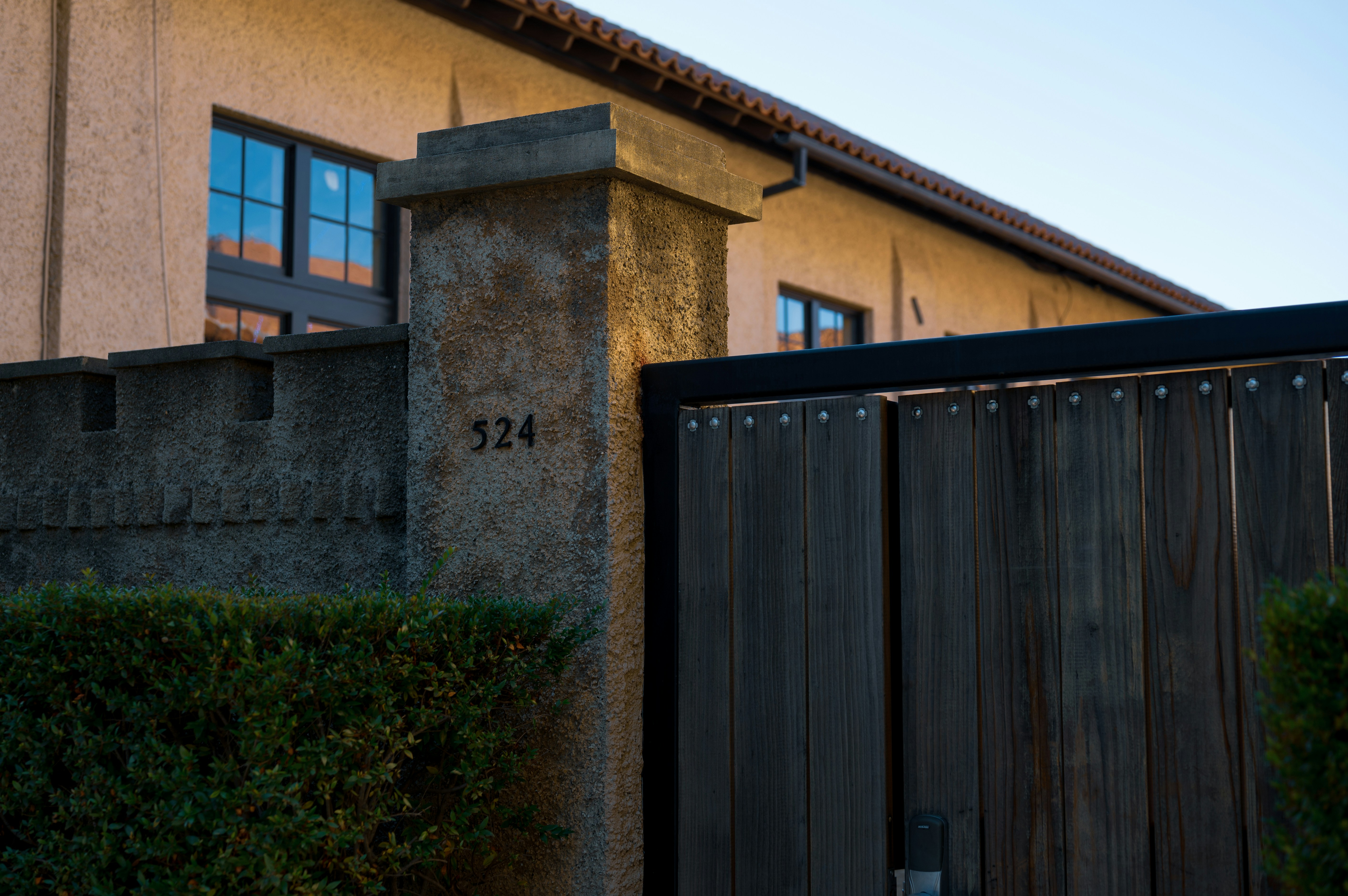 a building with a gate and a gate in front of it