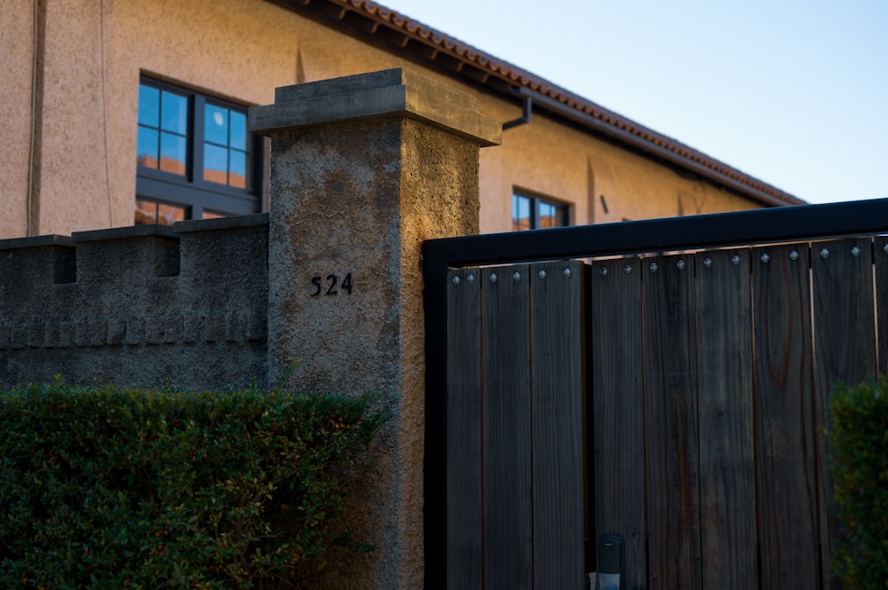 a building with a gate and a gate in front of it