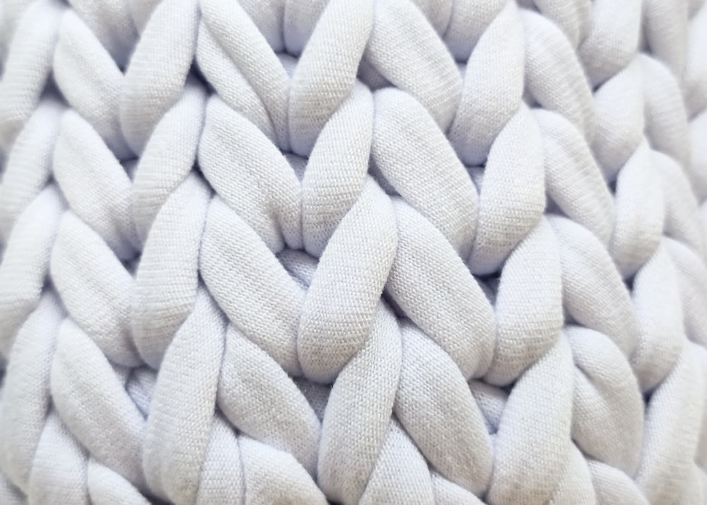 a close up of a white woven material