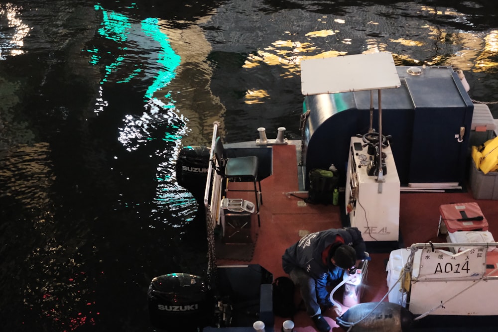 a small boat is docked on the water