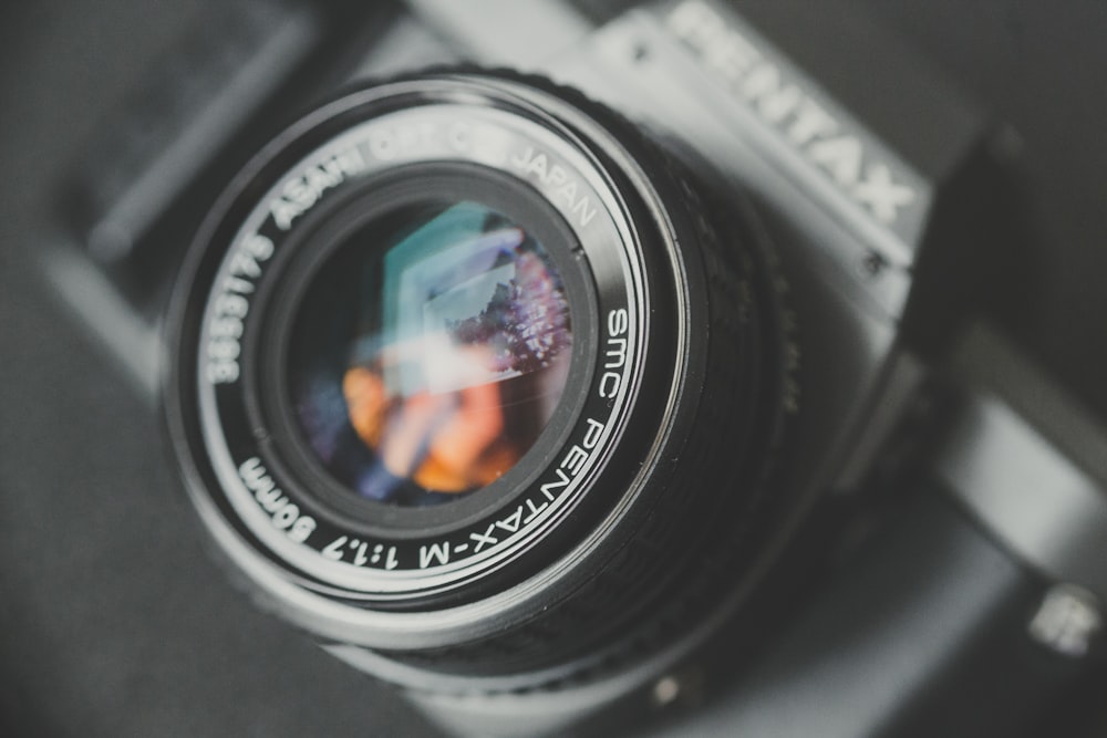 a close up of a camera with a lens