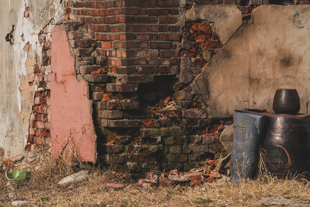 an old brick building with a broken window