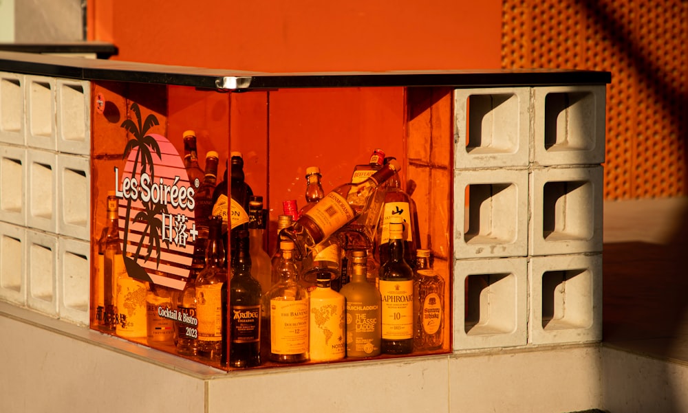 a display of bottles of alcohol in a window