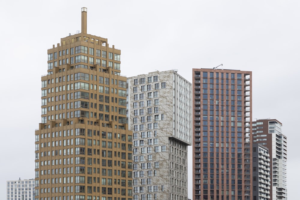 a group of tall buildings sitting next to each other