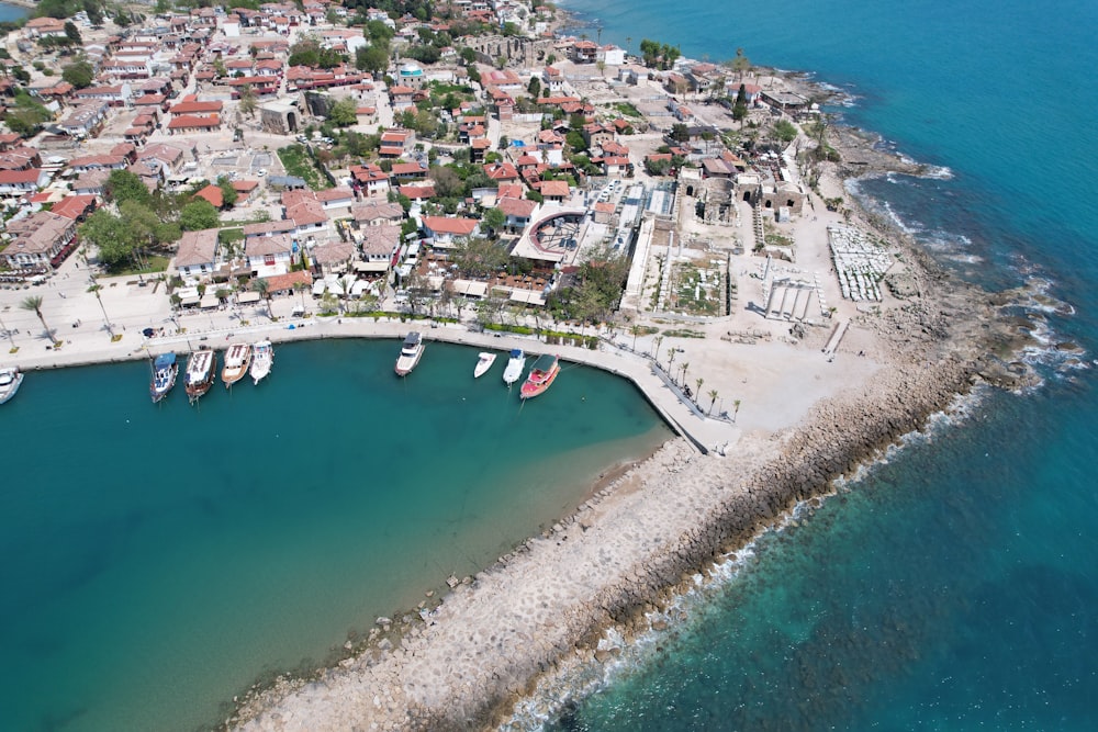 an aerial view of a small town and harbor