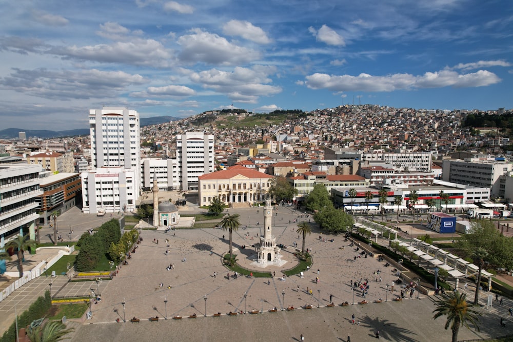 a city with a lot of buildings and a clock tower