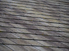 a close up of a roof made of wood planks