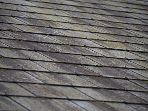 a close up of a roof made of wood planks
