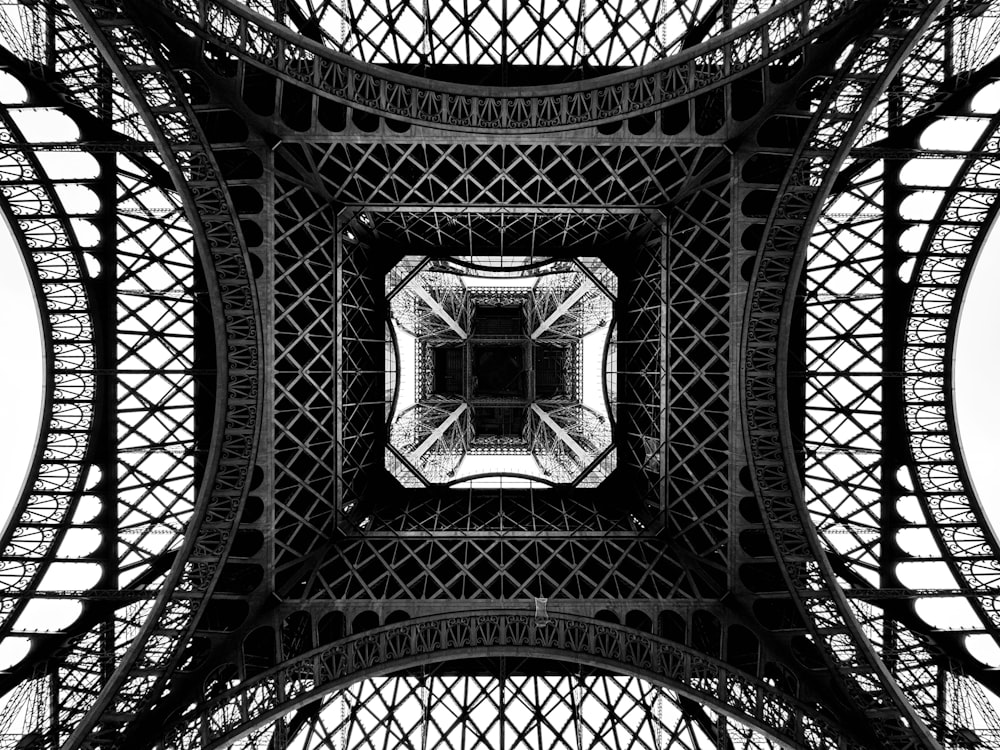 the top of the eiffel tower in black and white