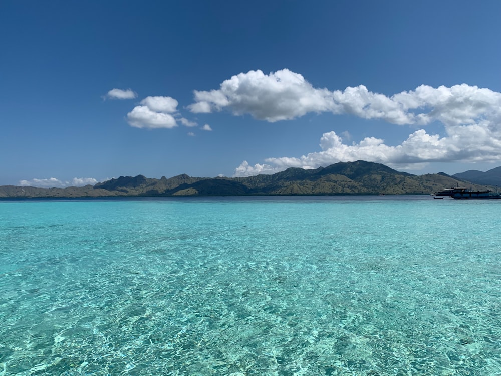 a large body of water surrounded by mountains