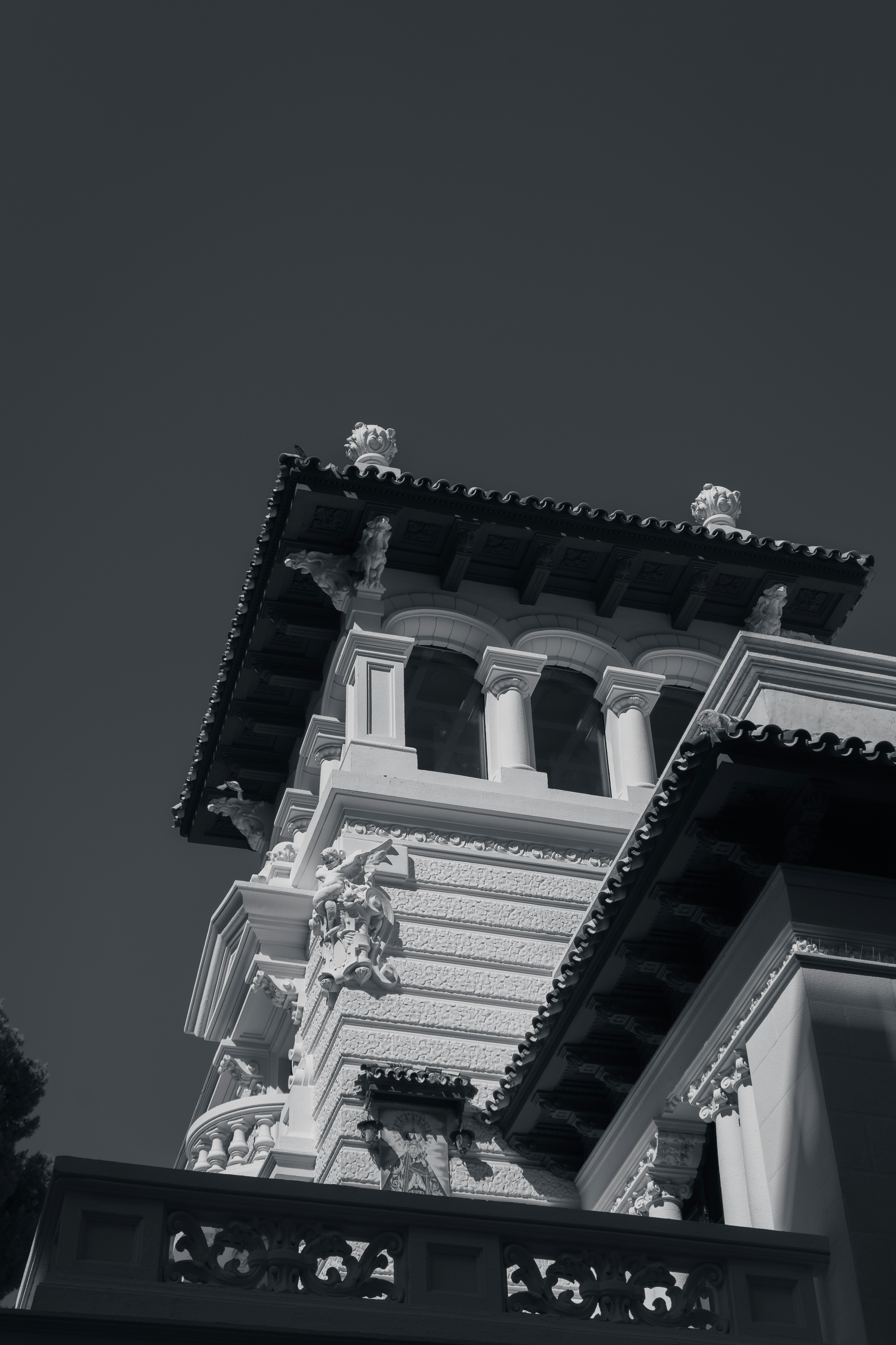 a black and white photo of a clock tower