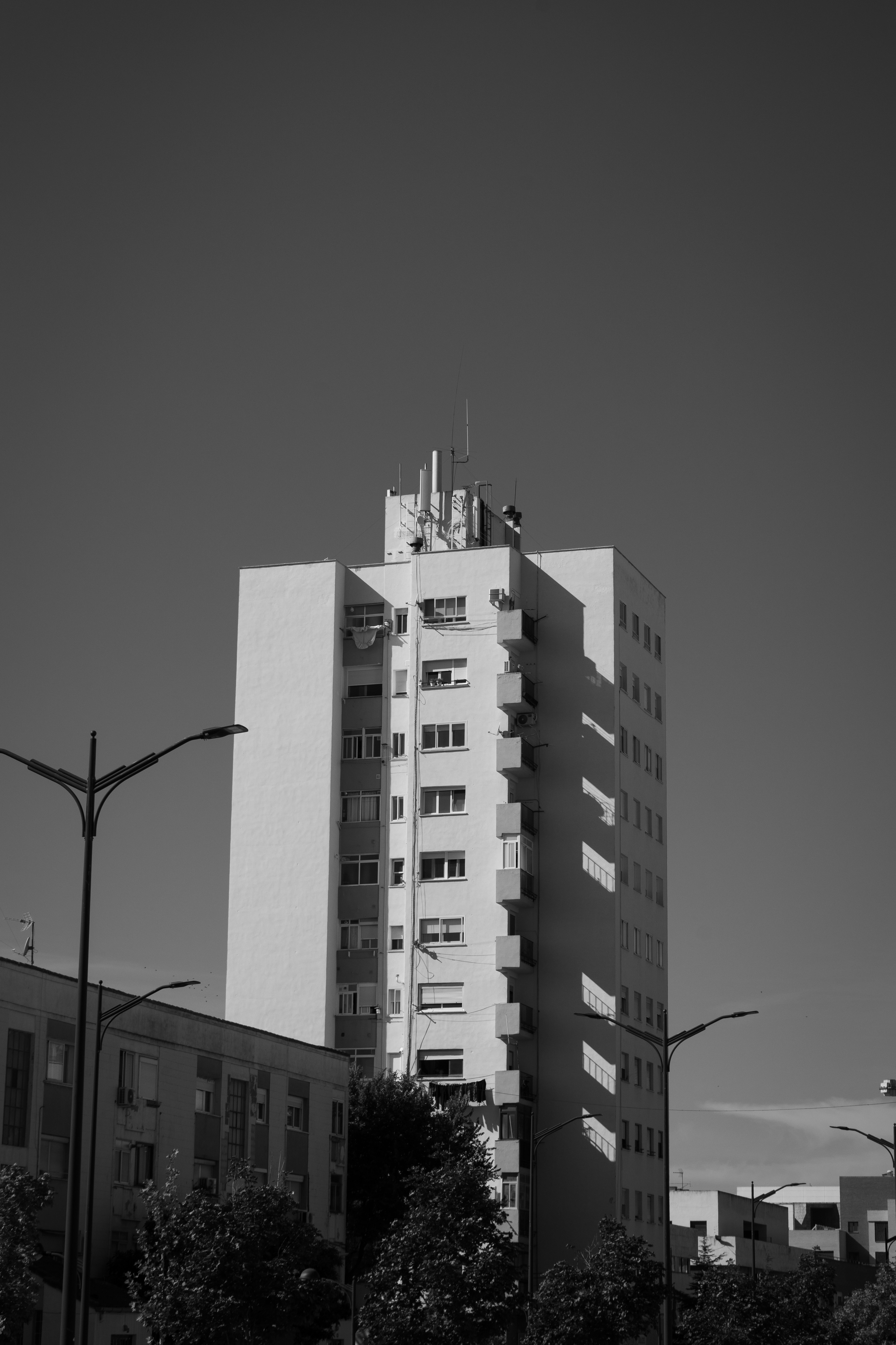 a black and white photo of a tall building