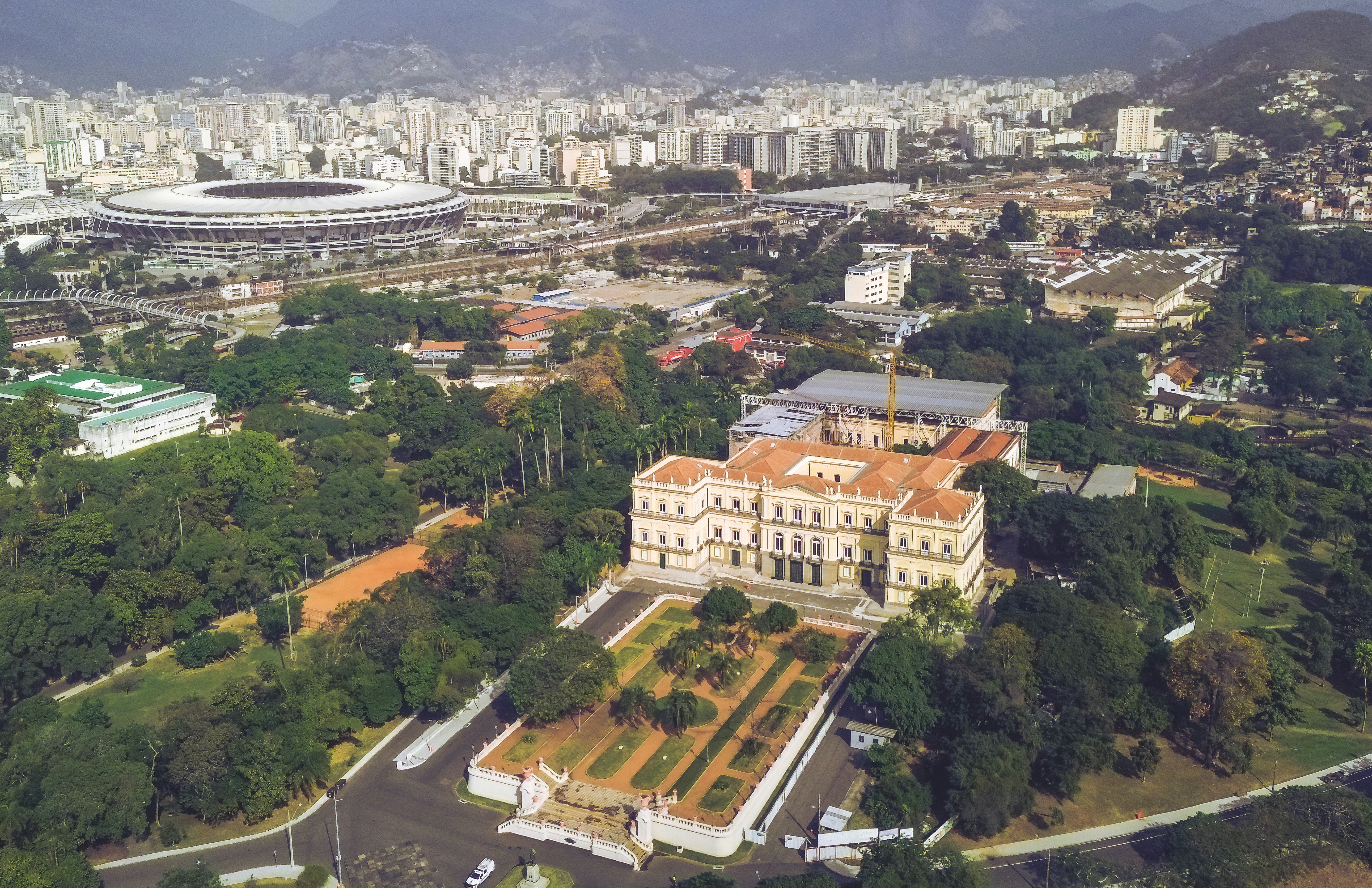 an aerial view of a large building in a city