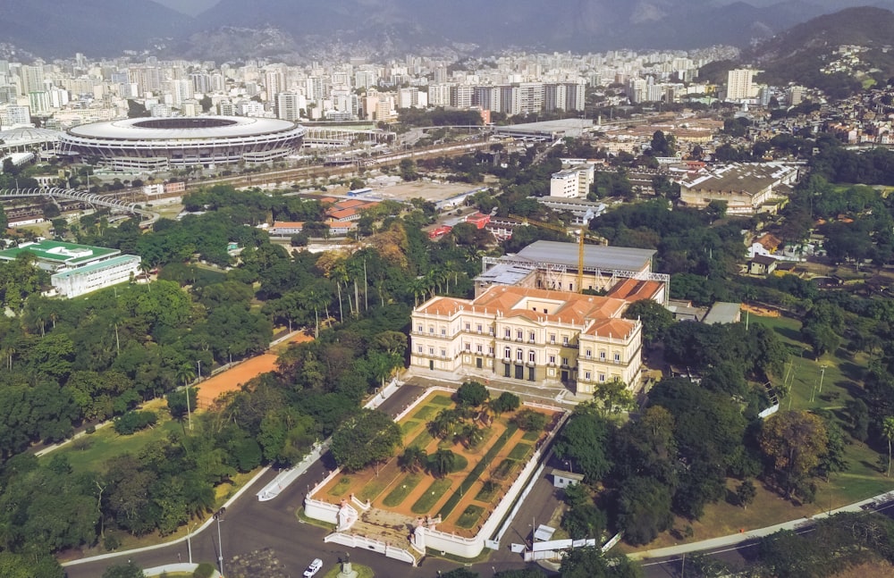 an aerial view of a large building in a city