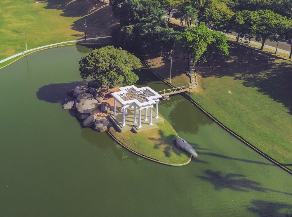 an aerial view of a gazebo surrounded by trees