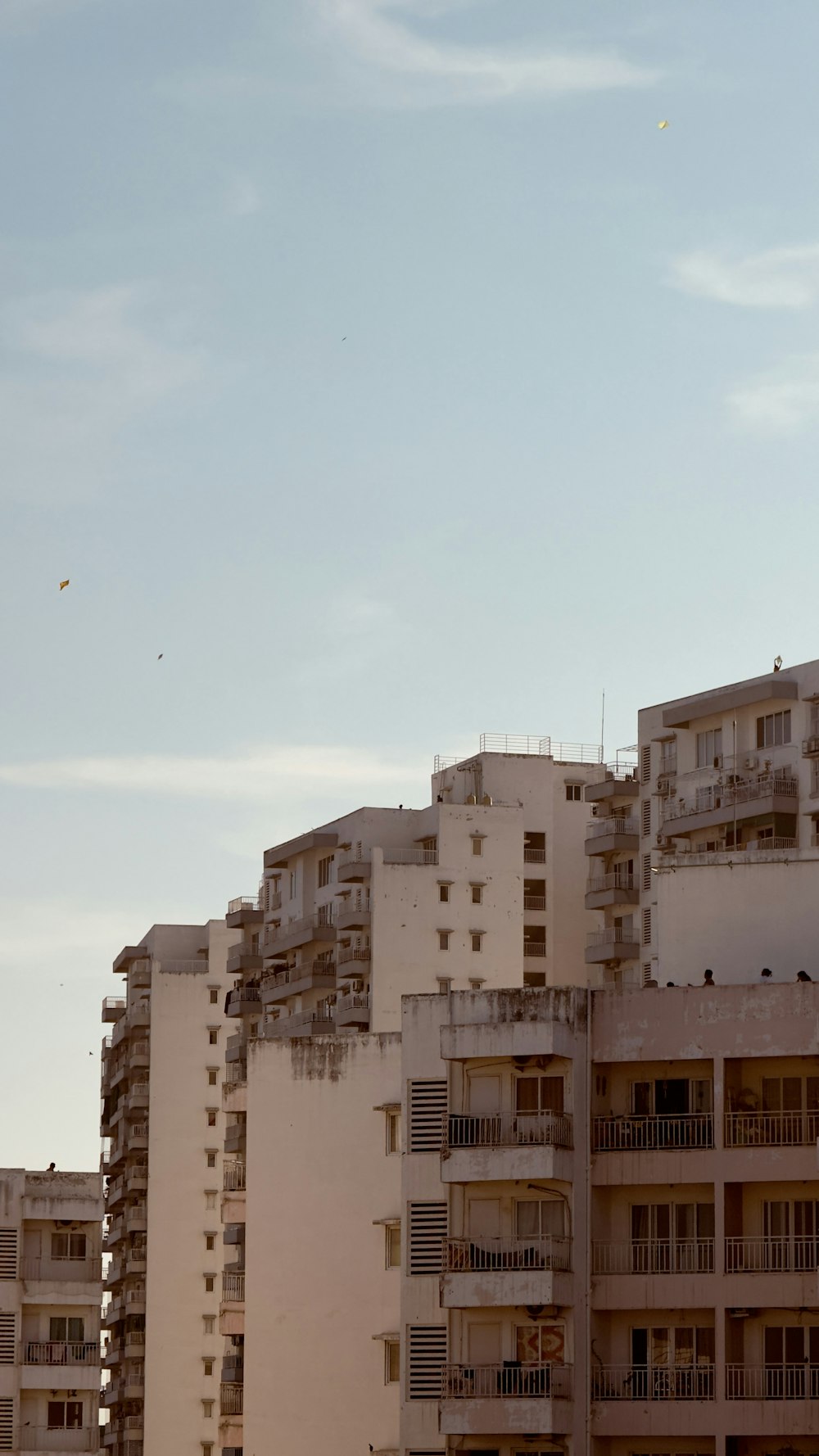 a tall building with balconies and balconies on top of it