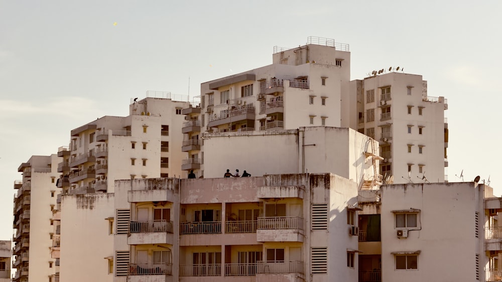 a tall building with balconies and balconies on top of it