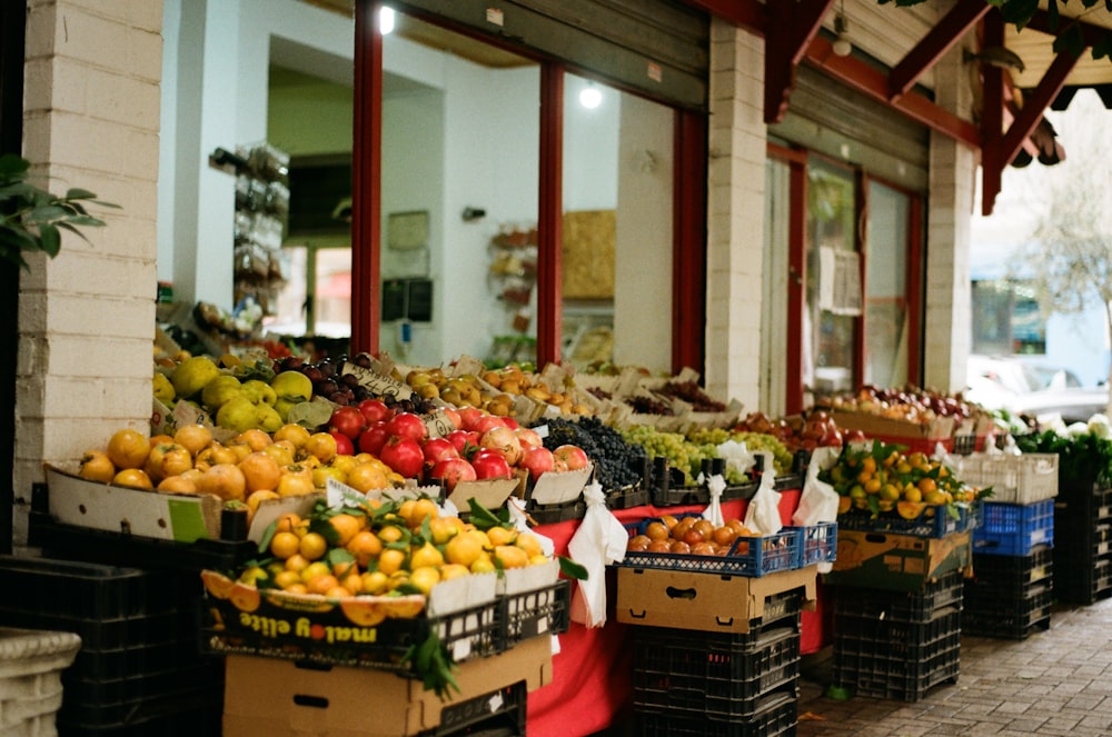 a bunch of boxes filled with lots of fruit