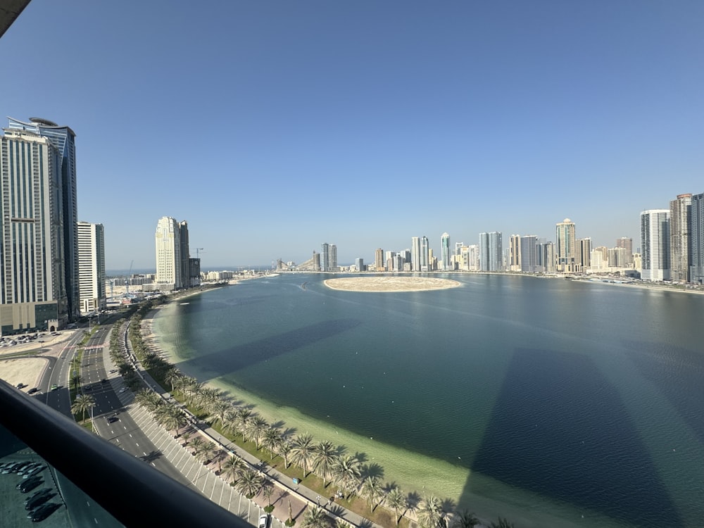 a large body of water surrounded by tall buildings