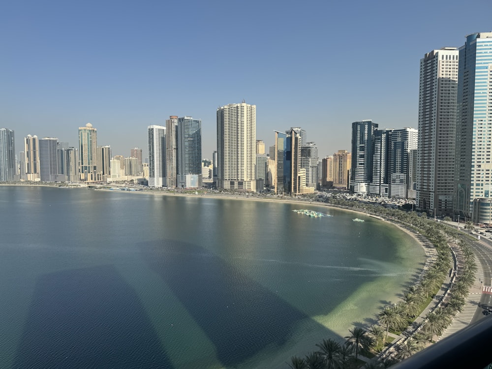 a large body of water surrounded by tall buildings