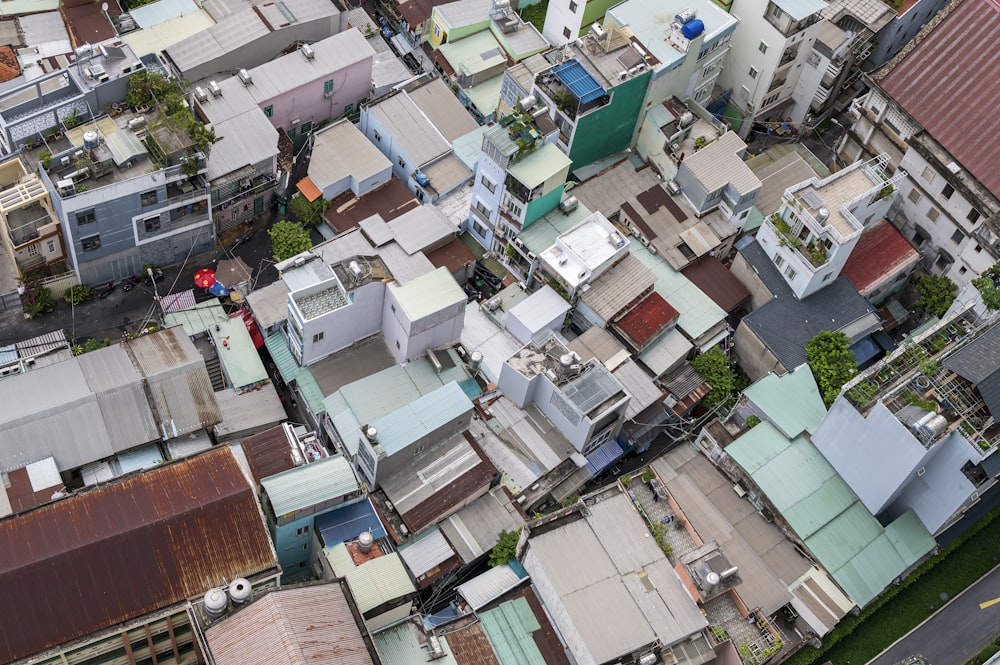 an aerial view of a city with lots of houses