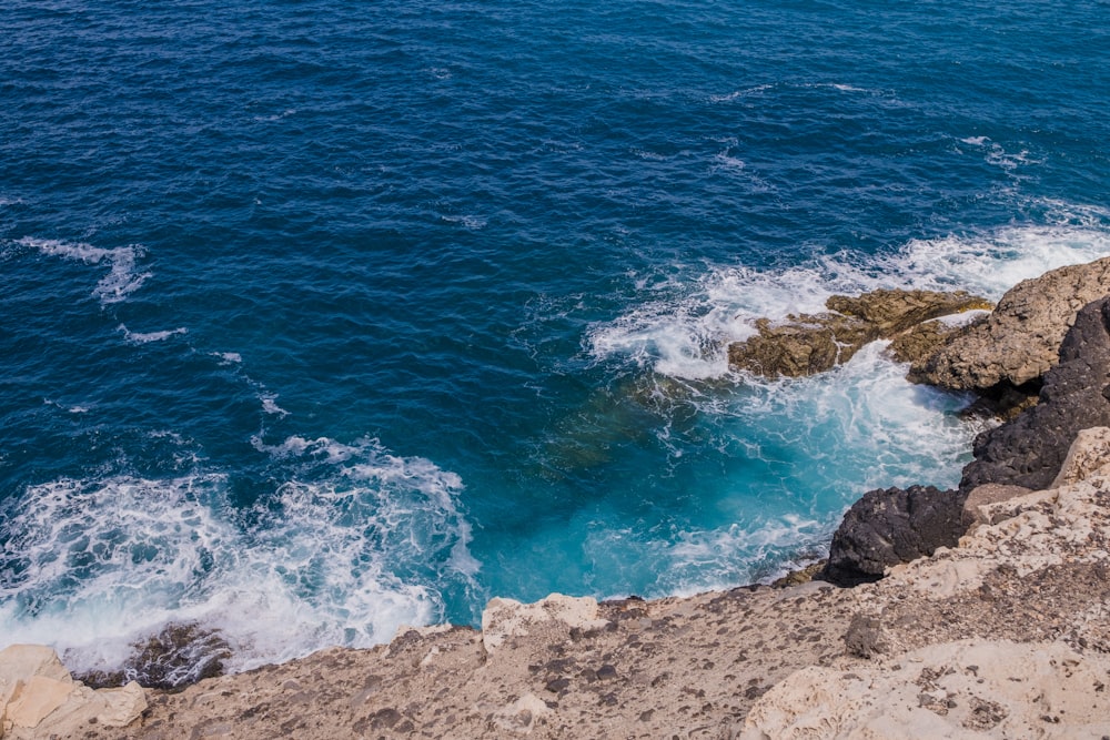 a view of a body of water from a cliff