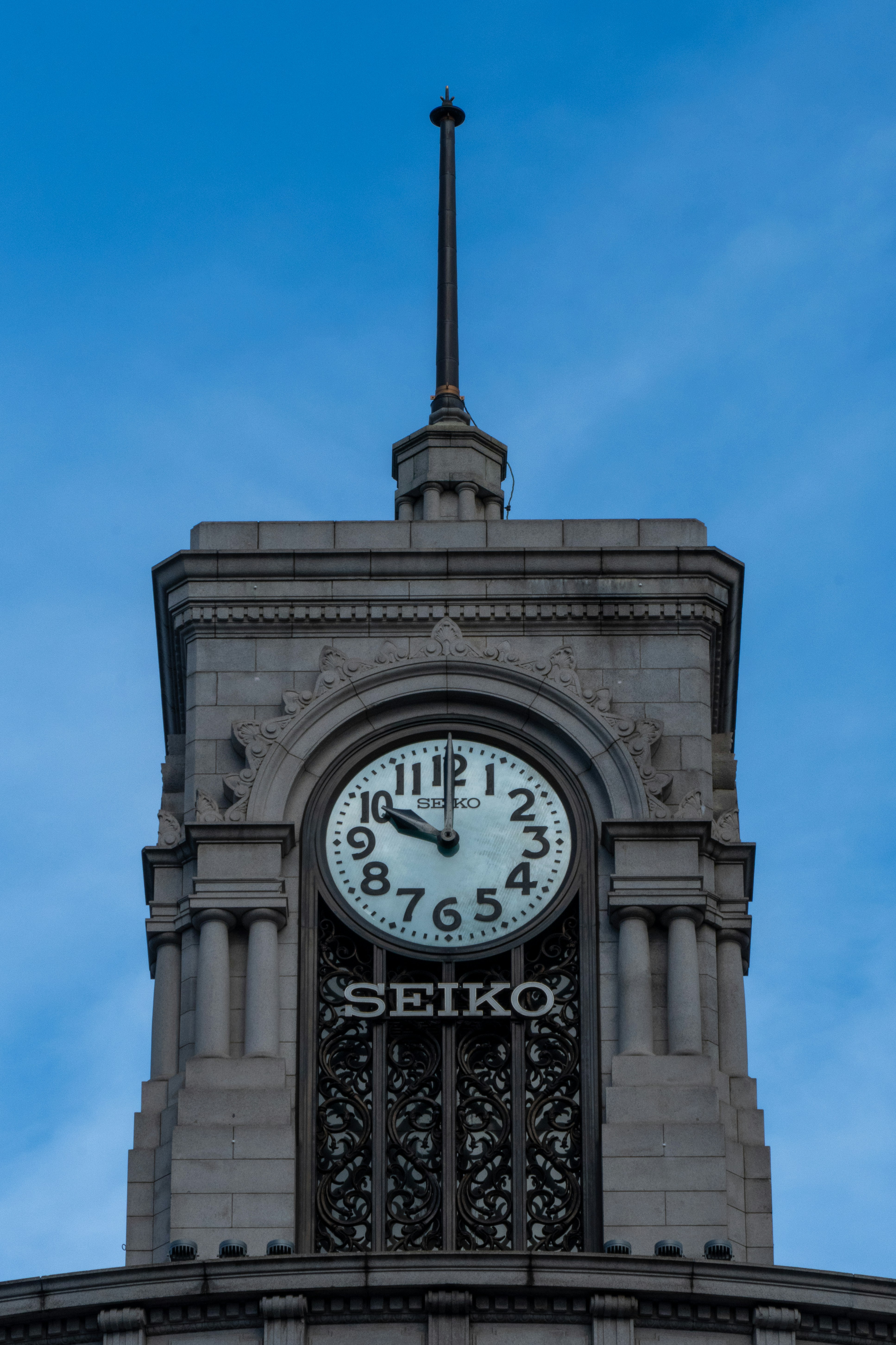 a clock tower with a sky background