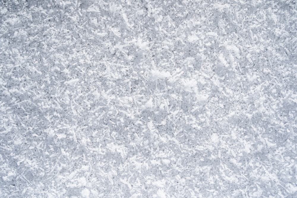 a close up of a white marble surface