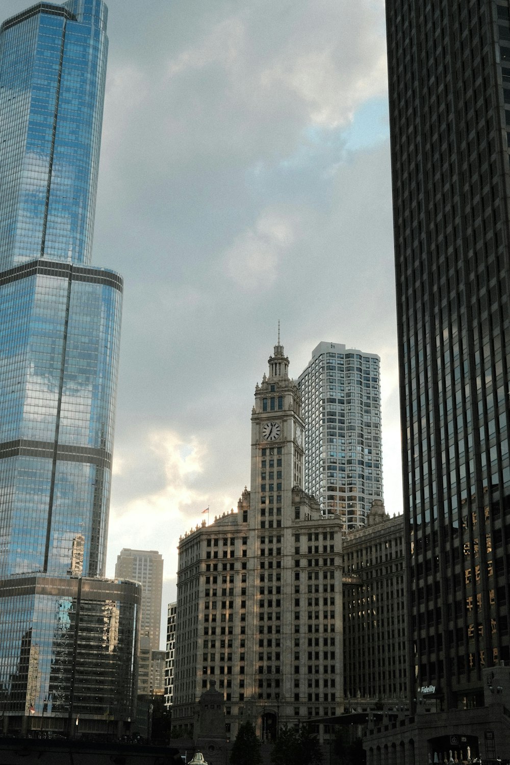 a view of some very tall buildings in the city