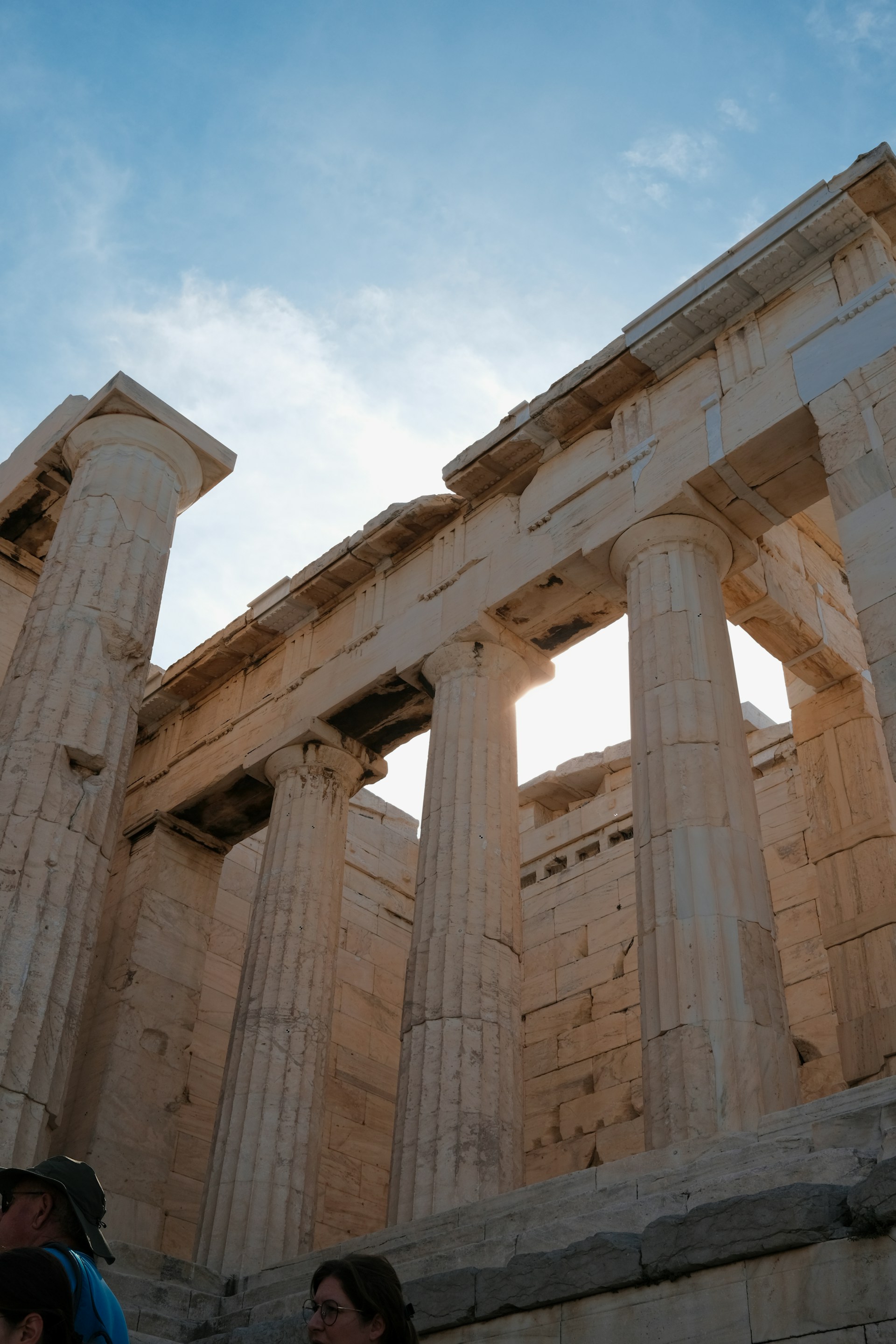 a couple of people standing in front of a building