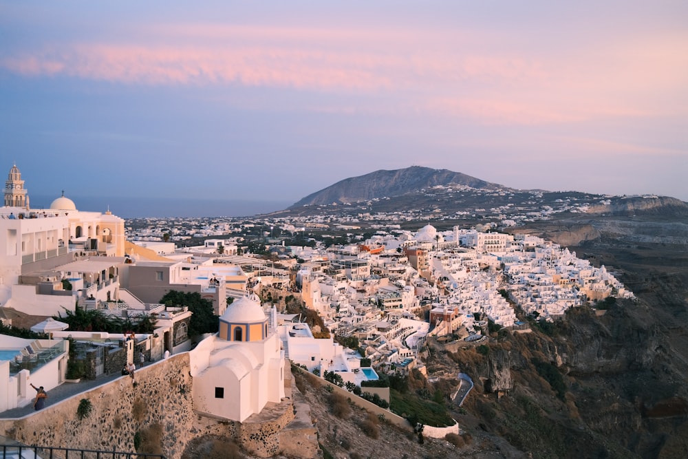 a view of a city with a mountain in the background