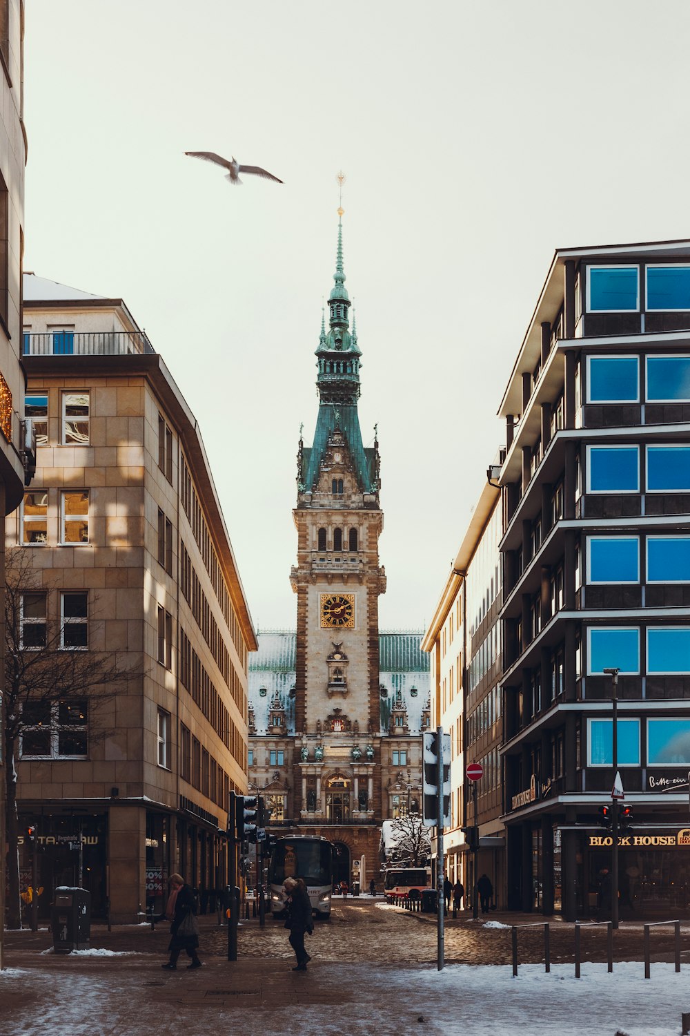 a large clock tower towering over a city