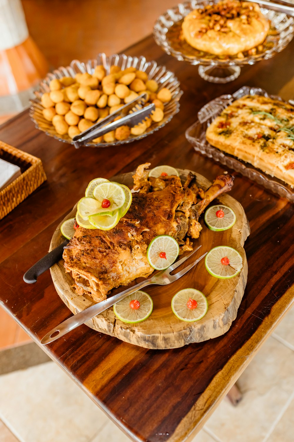 a wooden table topped with lots of food