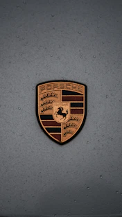 a porsche emblem on the side of a car