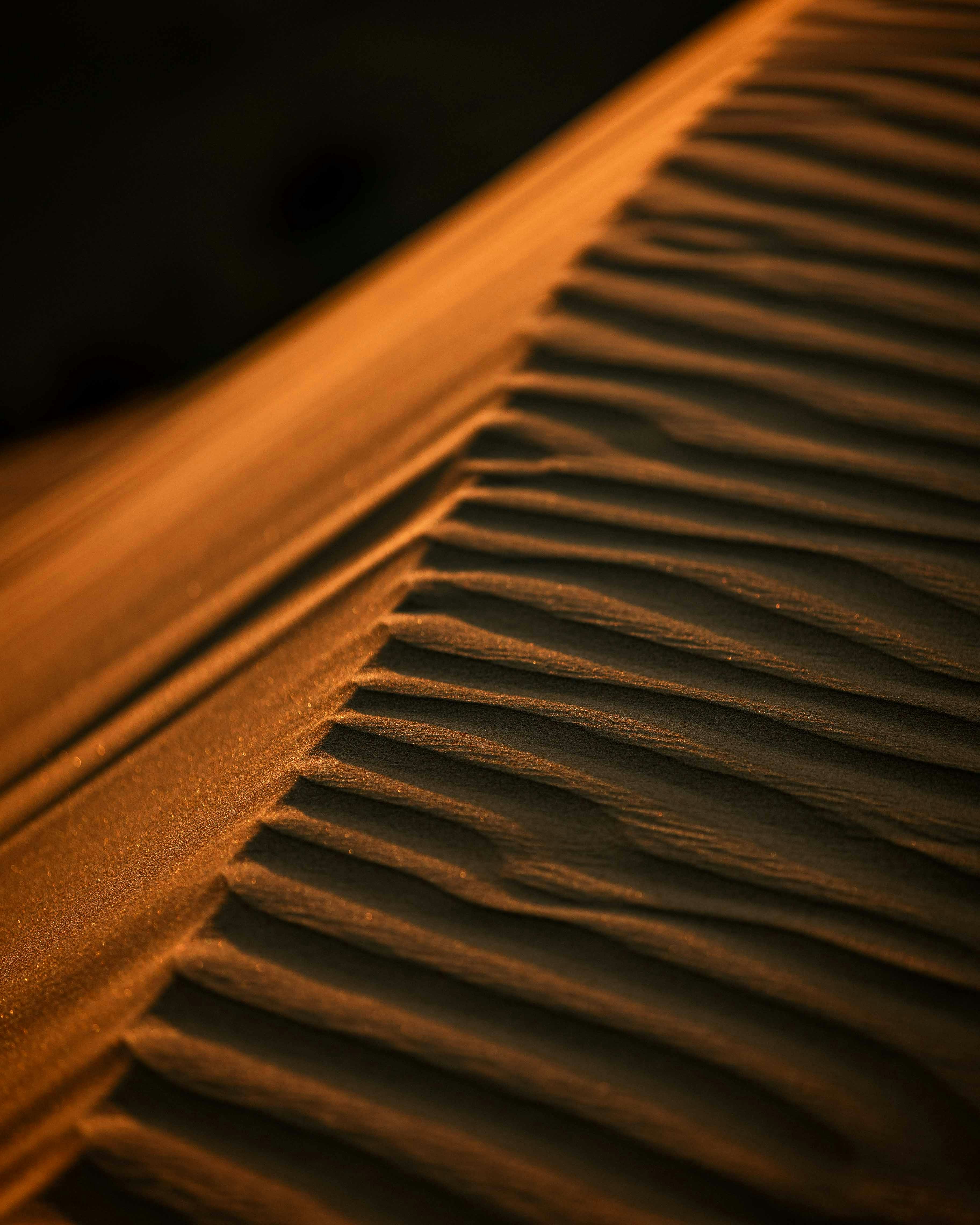 a close up of a sand dune in the desert