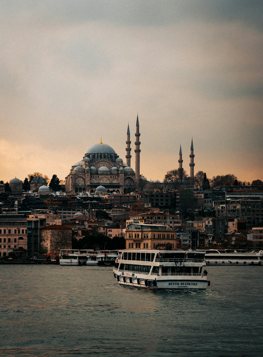 a large boat floating on top of a body of water