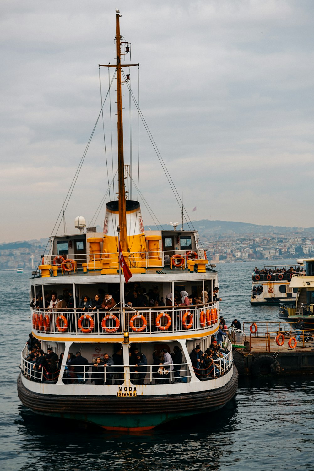 a large boat floating on top of a body of water