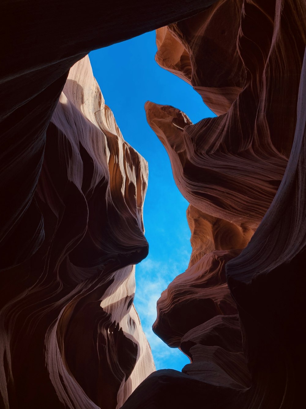 a narrow slot in the side of a canyon