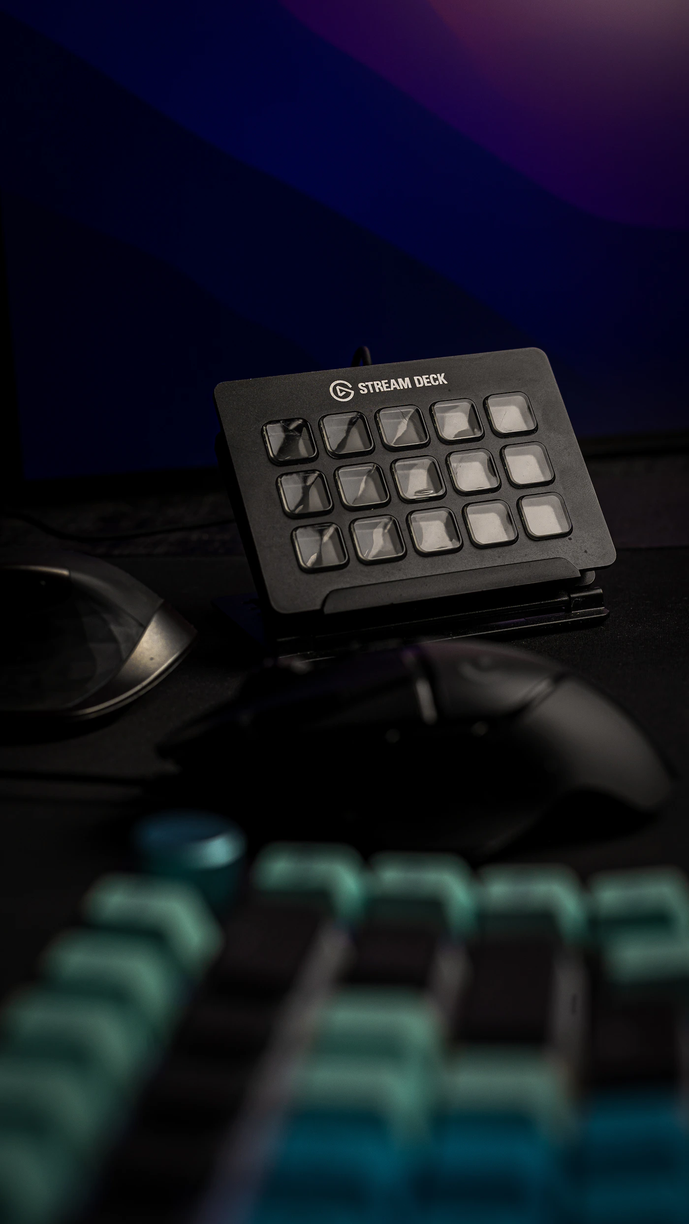 Stream control device beside a gaming keyboard and mouse