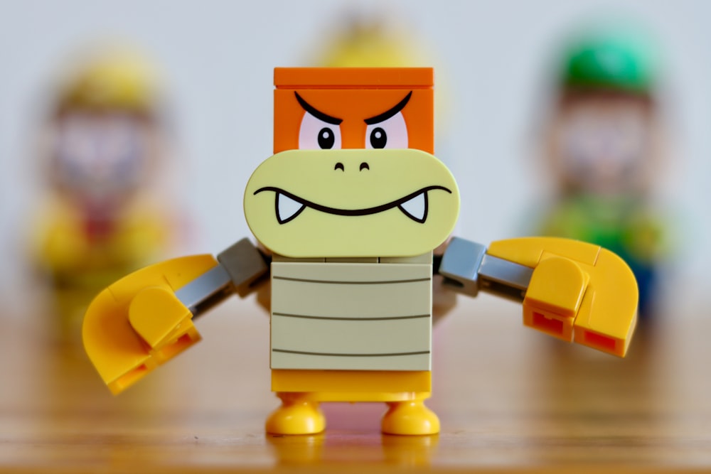 a close up of a lego figure on a table