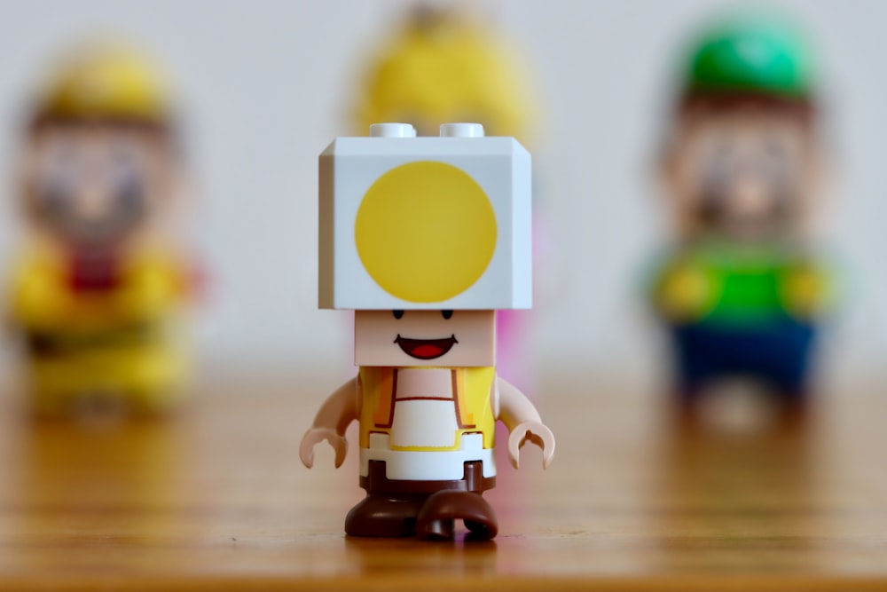 a close up of a lego figure on a table