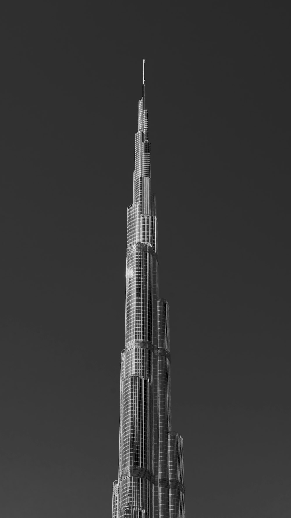 a black and white photo of a tall building